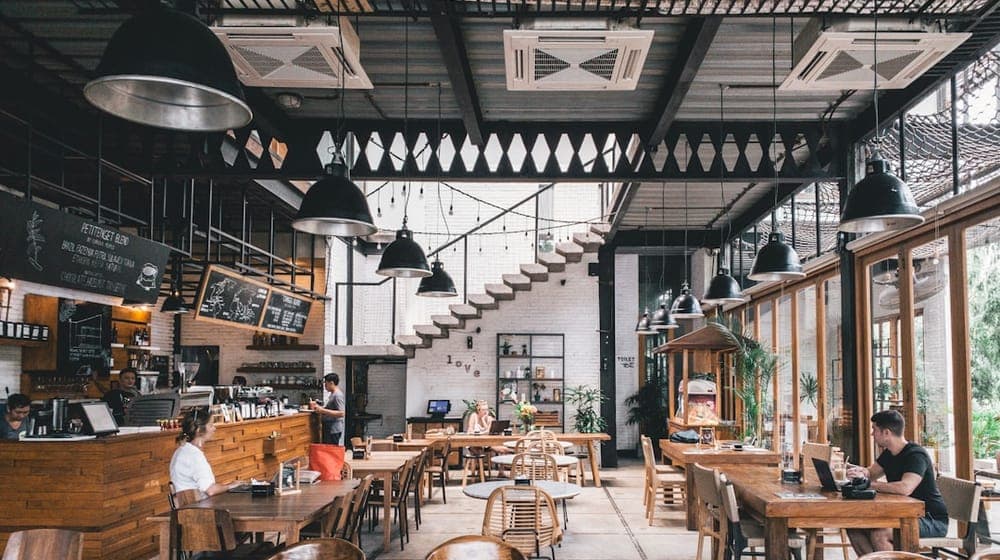 interior of rustic cafe with wooden tables